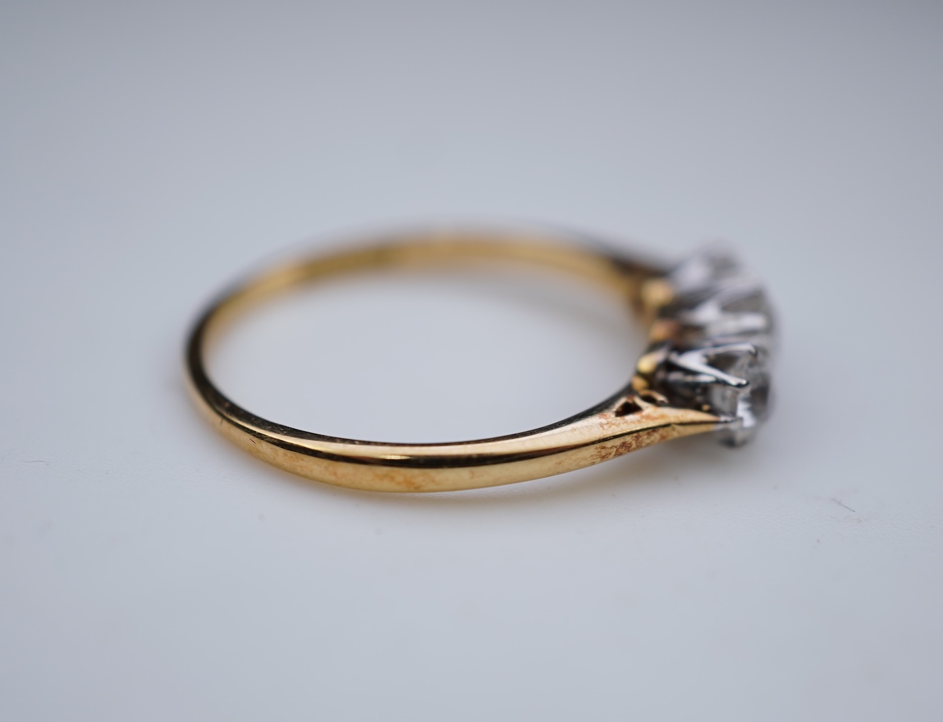 A three-stone diamond ring, early 20th century